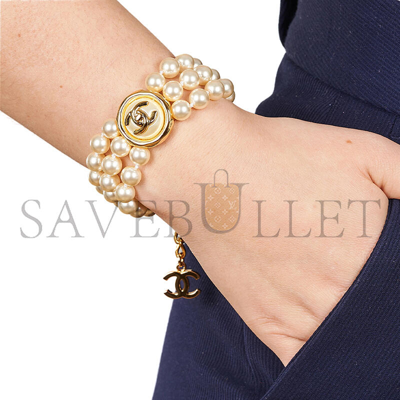 Ch**el triple strand faux pearl bracelet